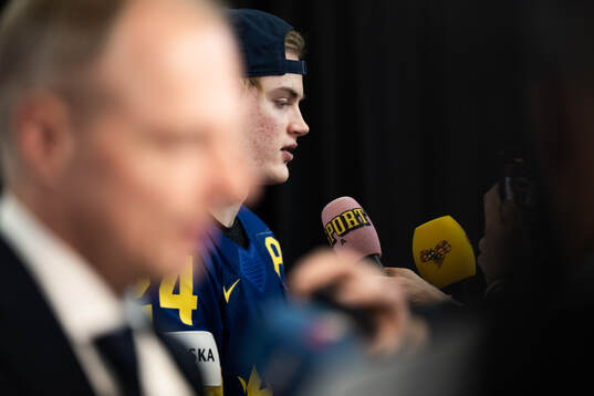 Tom Willander of Sweden is interviewed in the mixedzone