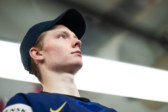 Goaltender Melker Thelin of Sweden is interviewed in the