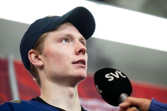 Goaltender Melker Thelin of Sweden is interviewed in the