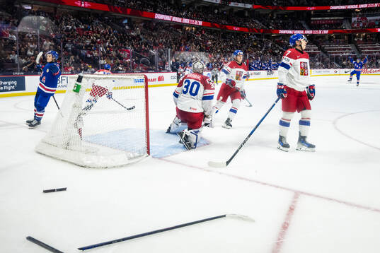 James Hagens of USA celebrates while goaltender Michael