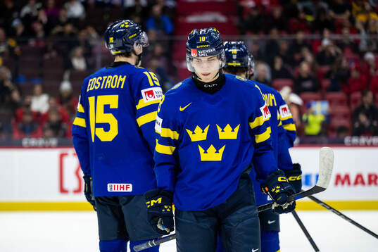 Victor Eklund of Sweden looks dejected