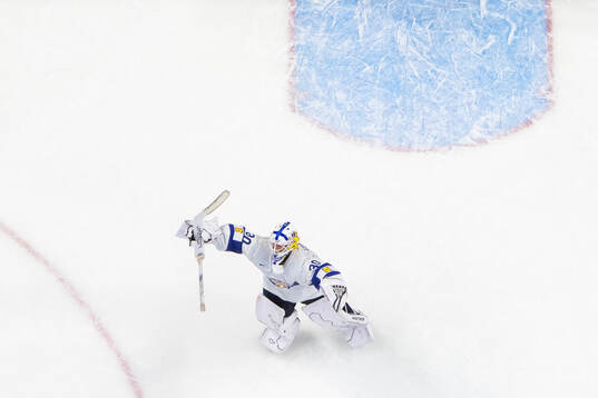 Goaltender Petteri Rimpinen of Finland celebrates