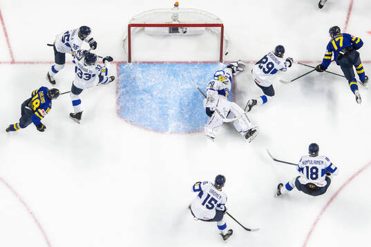 Arttu Tuhkala, Aron Kiviharju, goaltender Petteri Rimpinen,