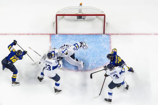 Victor Eklund and David Edstrom of Sweden compete for the