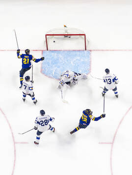Herman Träff and Anton Wahlberg of Sweden celebrate while