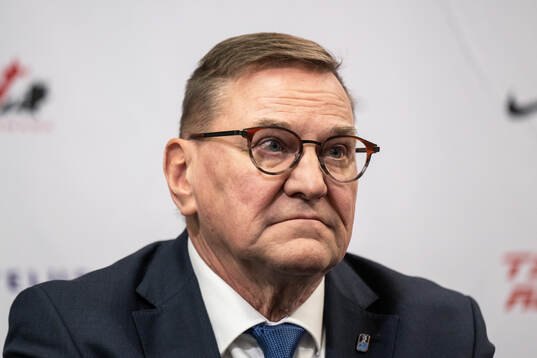 Heikki Hietanen council member of IIHF at a IIHF press