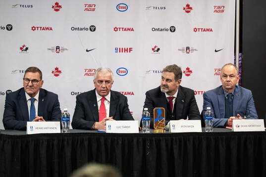 Heikki Hietanen council member of IIHF, Luc Tardif