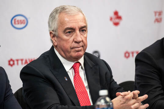 Luc Tardif President of IIHF at a IIHF press conference