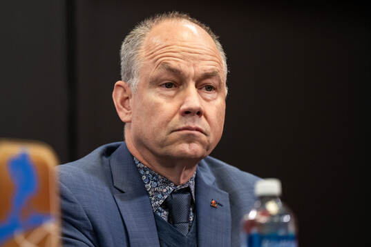 Dean Mcintosh Hockey Canada at a IIHF press conference