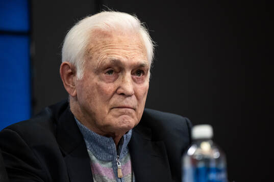 Lou Nanne at a IIHF press conference