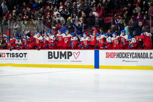 Players of Czech Republic celebrate scoring a penalty
