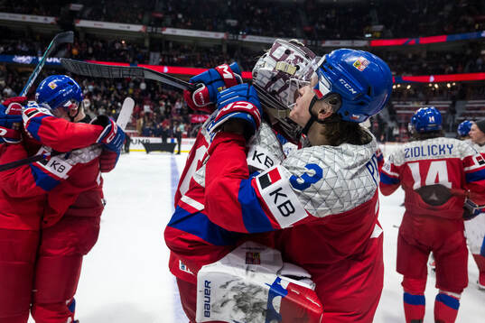 Goaltender Michael Hrabal and Vojtech Port  of Czech