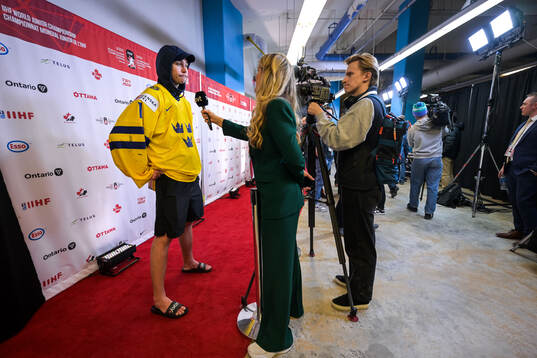 Goaltender Marcus Gidlöf of Sweden being interviewed