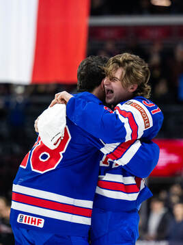 Zeev Buuim and Cole Eiserman of USA celebrate