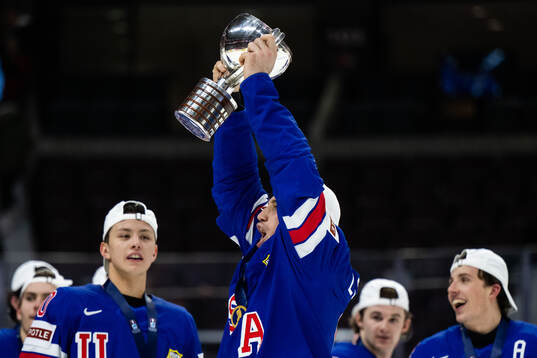 Ryan Leonard of USA celebrates with the trophy