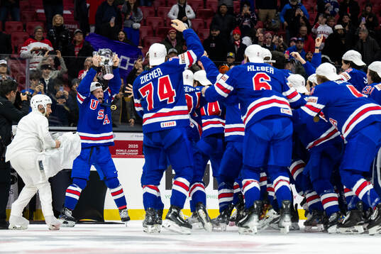 Ryan Leonard of USA celebrates with the trophy