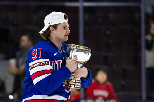 Cole Eiserman of USA celebrates with the trophy