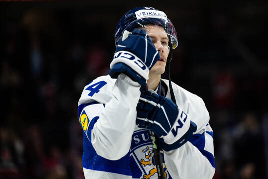 Jesse Nurmi of Finland looks dejected