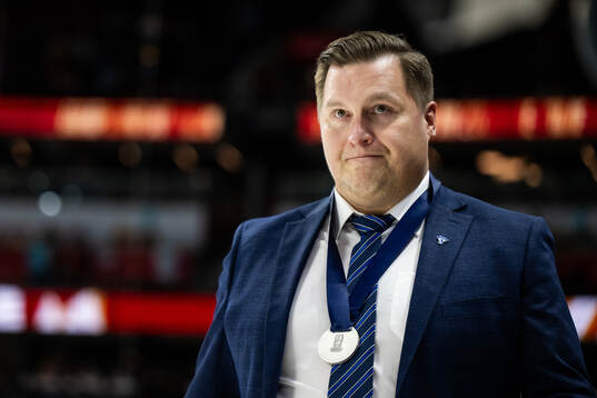 Head coach Lauri Mikkola of Finland looks dejected