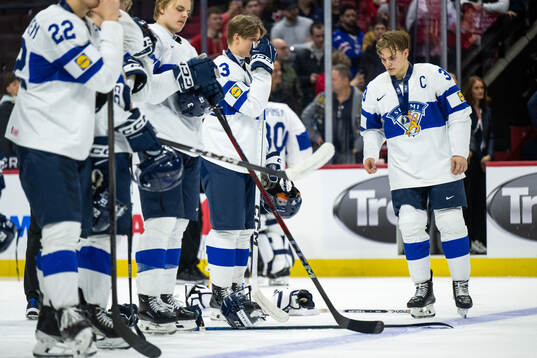 Aron Kiviharju of Finland looks dejected
