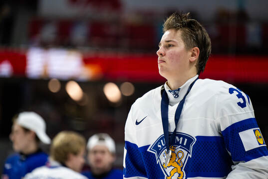 Benjamin Rautiainen of Finland looks dejected