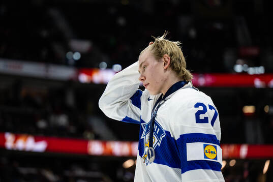 Julius Miettinen of Finland looks dejected