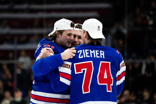 Cole Eiserman and Brodie Ziemer of USA celebrate