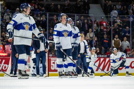 Arrtu Alasiurua and Heikki Ruohonen of Finland look dejected
