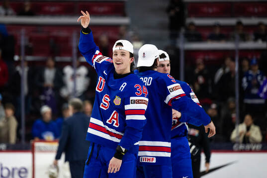 Gabe Perreault of USA celebrates