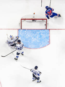 Goaltender Petteri Rimpinen, Julius Miettinen and Rasmus