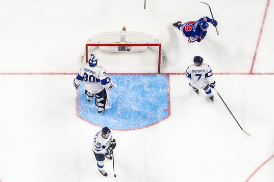 Arttu Tuhkala, goaltender Petteri Rimpinen and Daniel