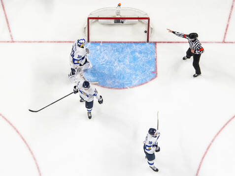 Goaltender Petteri Rimpinen, Julius Miettinen and Rasmus