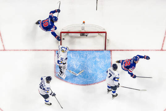 Arttu Tuhkala, goaltender Petteri Rimpinen and Daniel