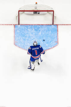 Goaltender Trey Augustine of USA look dejected