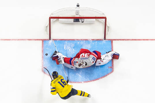 Goaltender Michael Hrabal of Czech Republic makes a save