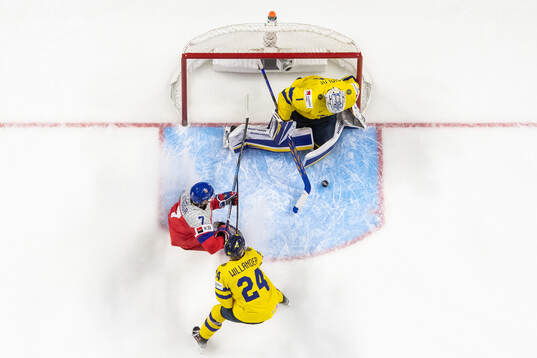 Goaltender Marcus Gidlöf and Tom Willander of Sweden