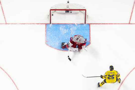 Otto Stenberg of Sweden scores