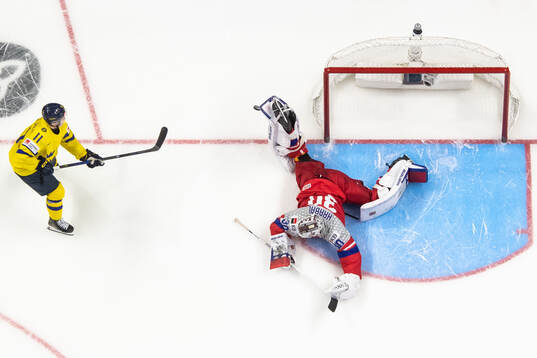 Goaltender Michael Hrabal of Czech Republic makes a save