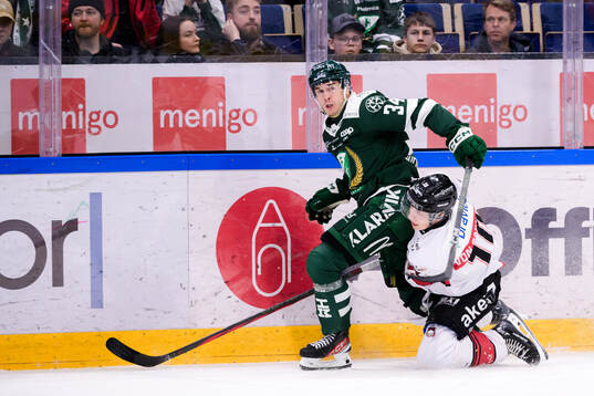 Färjestads Michael Lindqvist och Malmö Redhawks William
