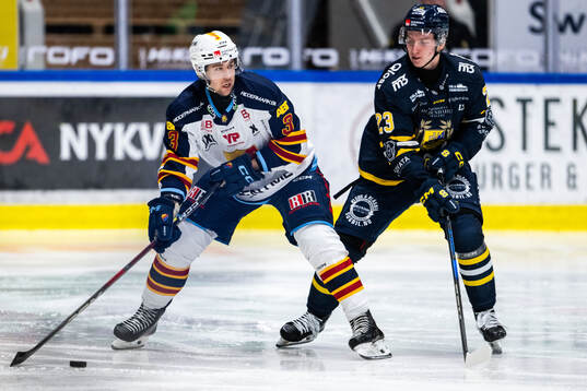 Djurgårdens August Berg och Södertäljes Egor Polin