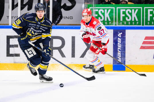 HV71s Henrik Borgström och Timrås Anton Wedin