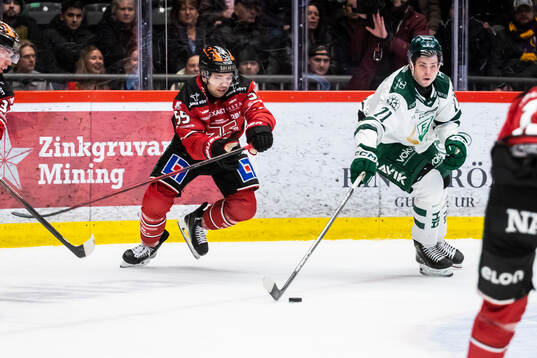 Örebros David Quenneville och Färjestads Viktor Lodin