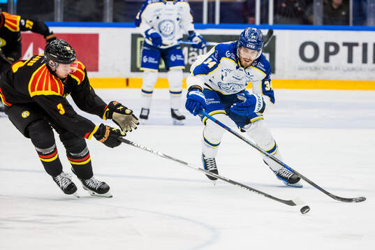 Brynäs Christian Djoos och Leksands Peter Cehlarik