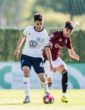 Kenan Busuladzic of Malmö FF and Veljko Birmancevic of