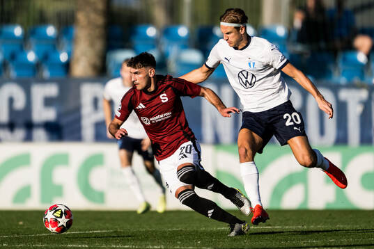 Qazim Laci of Sparta Prag and Erik Botheim of Malmö FF