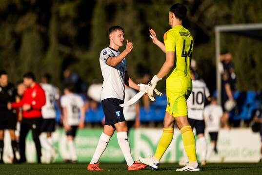 Sebastian Jörgensen of Malmö FF and Goalkeeper Jakub