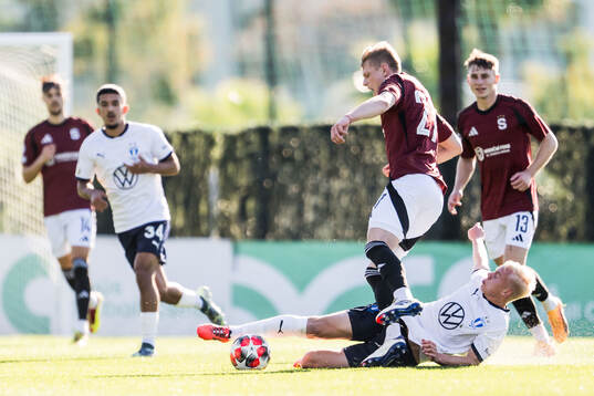 Patrik Vydra of Sparta Prag and Otto Rosengren of Malmö FF
