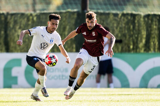 Adrian Skogmar of Malmö FF and Elias Cobbaut of Sparta Prag