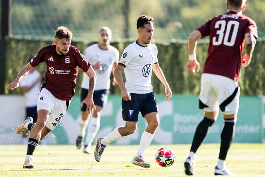 Elias Cobbaut of Sparta Prag and Adrian Skogmar of Malmö FF