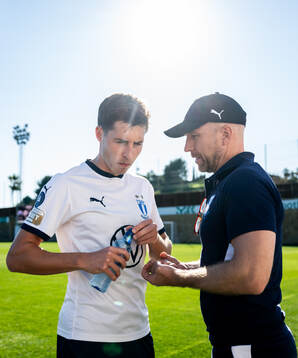 Lasse Berg Johnsen and head coach Henrik Rydström of